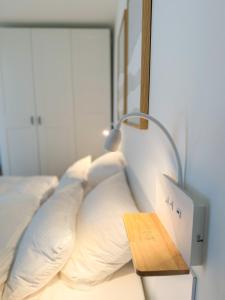 En eller flere senge i et værelse på Apartment Wolfswarte, Panorama, Sauna, Schwimmbad