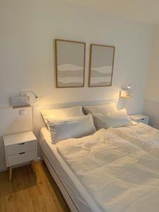 En eller flere senge i et værelse på Apartment Wolfswarte, Panorama, Sauna, Schwimmbad