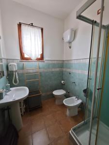 Koupelna v ubytování B&B Domu Delunas