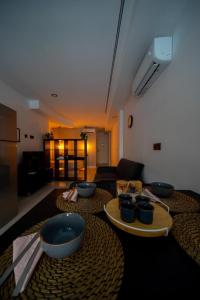 a living room with a table with bowls on it at Accommodation for 4 people in Valencia