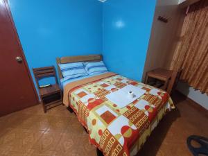 Letto o letti in una camera di Hospedaje Leo