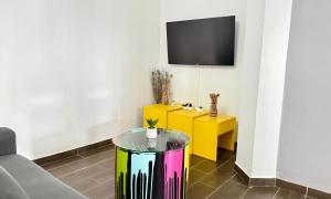 TV a/nebo společenská místnost v ubytování Pitaya Lodge by Lodge Paradise
