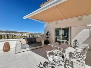 Balkón nebo terasa v ubytování Stunning penthouse with beautiful golf views
