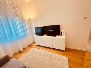 TV a/nebo společenská místnost v ubytování Hotel Pex Mantova
