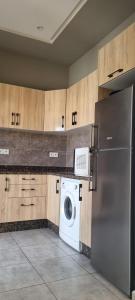 Η κουζίνα ή μικρή κουζίνα στο Rawnak la maison rouge