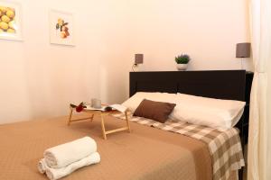 Ένα ή περισσότερα κρεβάτια σε δωμάτιο στο Moire Apulian Apartment +21 φωτογραφίες