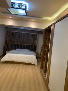 Katil atau katil-katil dalam bilik di Rahma Hotel abartments