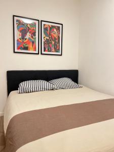 Un pat sau paturi într-o cameră la Brussels center