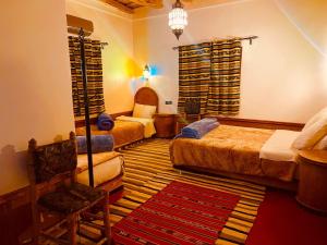 Postel nebo postele na pokoji v ubytování Auberge la belle vue dades