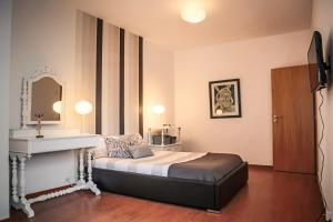 Ένα ή περισσότερα κρεβάτια σε δωμάτιο στο Casa Mãe Deus - House Azores