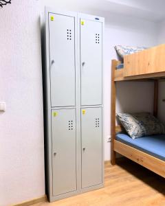 Postel nebo postele na pokoji v ubytování Hostel Cozzydine