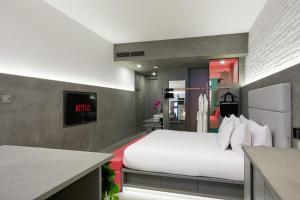 Llit o llits en una habitació de David Hotel