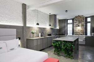 Llit o llits en una habitació de David Hotel