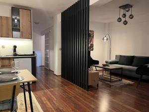Kuchyň nebo kuchyňský kout v ubytování Liberte Apartments Voždovac + 11 fotografií