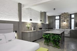 Llit o llits en una habitació de David Hotel