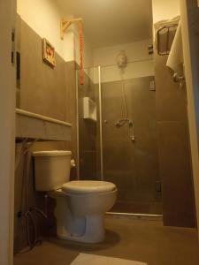 Et badeværelse på Flat Montese Tower Resende - Refúgio na Serra da Mantiqueira, Próximo à AMAN e Penedo + 5 billeder