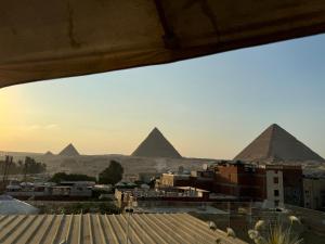 Foto de la galería de Pyramids and sphinx Magic en El Cairo