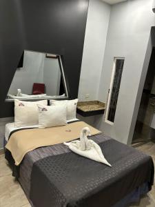 Postel nebo postele na pokoji v ubytování Hotel Diaz