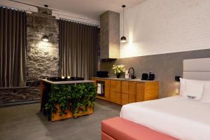 Llit o llits en una habitació de David Hotel