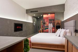Llit o llits en una habitació de David Hotel