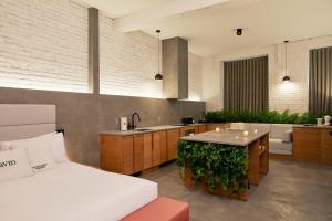 Llit o llits en una habitació de David Hotel