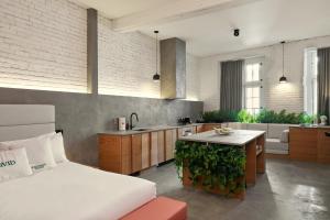 Llit o llits en una habitació de David Hotel