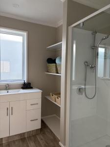 Uma casa de banho em The Nest on Till
