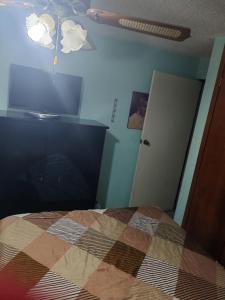 Μια τηλεόραση ή/και κέντρο ψυχαγωγίας στο Renta habitación