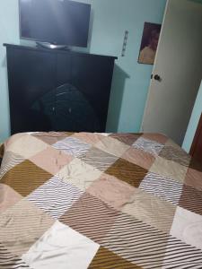 Μια τηλεόραση ή/και κέντρο ψυχαγωγίας στο Renta habitación