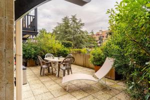 Ogród w obiekcie Côté Jardin - Terrasse, Calme et Cosy