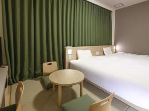 Cama ou camas em um quarto em Dormy Inn Kofu Natural Hot Spring Kaiji no Yu Reopening on February 3rd 2025