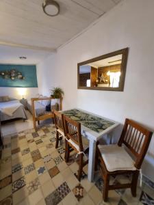 En eller flere senge i et værelse på Las casitas de Alva