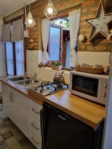 Køkken eller tekøkken på Las casitas de Alva