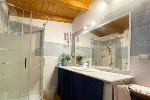 a bathroom with a sink and a shower at Holiday home in Sassari 53785 in Sassari