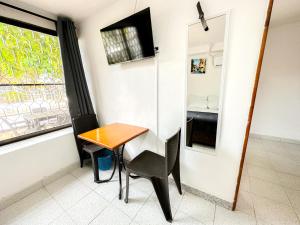TV a/nebo společenská místnost v ubytování Hotel CasaBlanca Cartagena