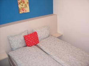 Postel nebo postele na pokoji v ubytování Trinity Apartment