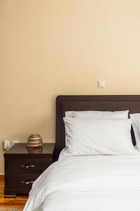 Ένα ή περισσότερα κρεβάτια σε δωμάτιο στο yOUR Apartement