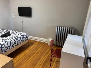 Private room in a shared apt Middletown near Wesley uni客房内的一张或多张床位