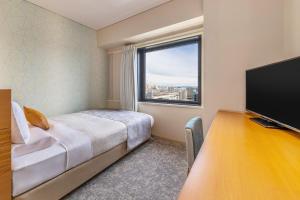 TV a/nebo společenská místnost v ubytování Art Hotel Niigata Station