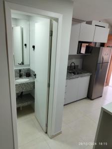 Kuchyň nebo kuchyňský kout v ubytování Loft 01 dormitório