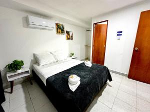 Postel nebo postele na pokoji v ubytování Hotel CasaBlanca Cartagena