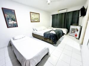 Postel nebo postele na pokoji v ubytování Hotel CasaBlanca Cartagena