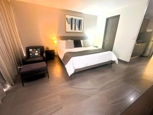Voodi või voodid majutusasutuse Arboleda 5 Luxury Lofts toas