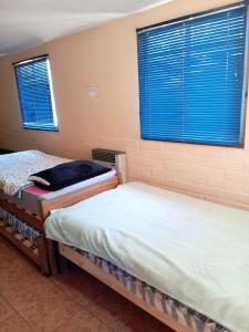 Postel nebo postele na pokoji v ubytování Parcela para descanso y eventos + 21 fotografií
