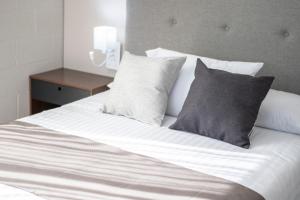 Voodi või voodid majutusasutuse Arboleda 5 Luxury Lofts toas