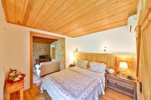 Postel nebo postele na pokoji v ubytování Tranquilla River Lodge