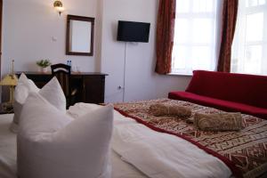 Postel nebo postele na pokoji v ubytování Villa Amadea