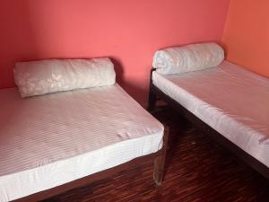 Postel nebo postele na pokoji v ubytování Bindabasini Home NO-9