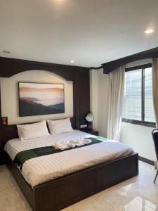 Katil atau katil-katil dalam bilik di Sumer guesthouses