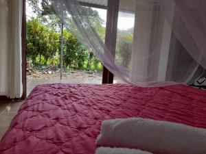Uma cama ou camas num quarto em Hostal Ariantiy